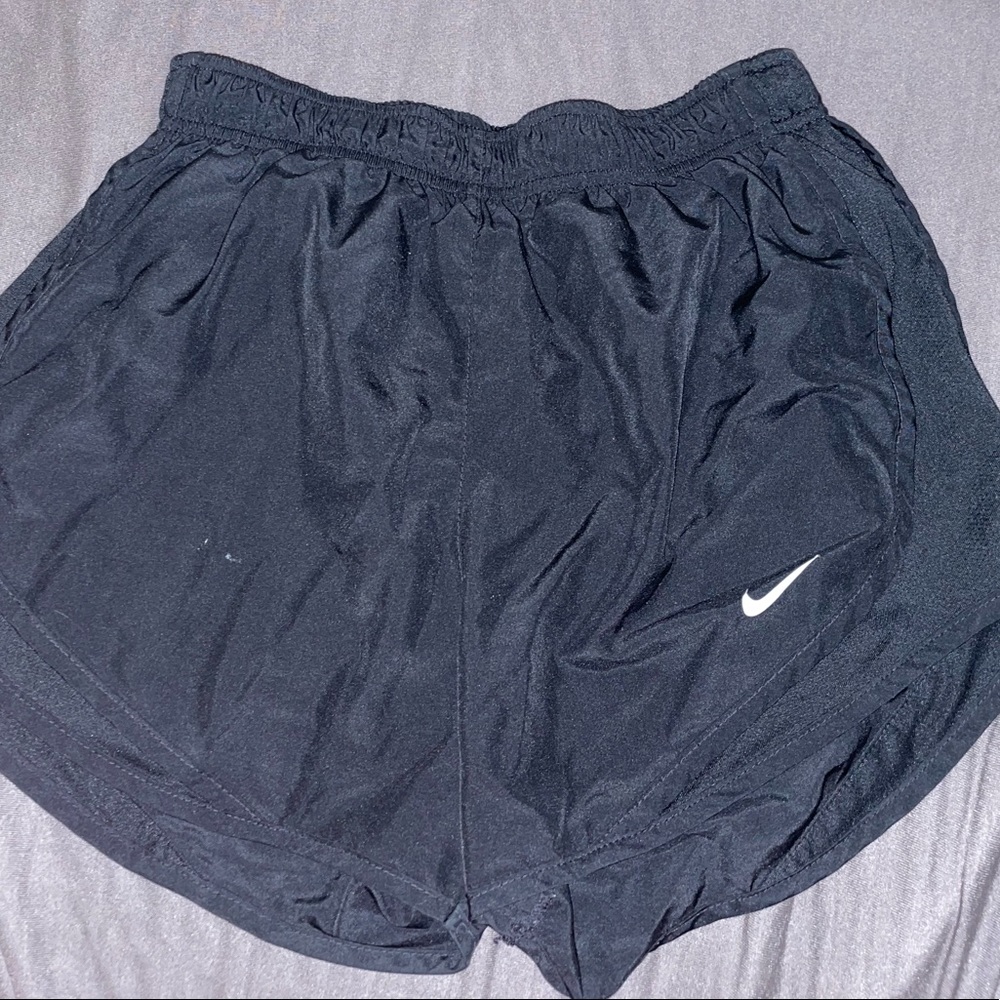 Solid black Nike running shorts
